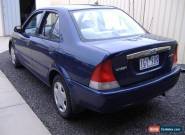 DAMAGED ford laser 2000 model auto for Sale