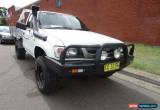 Classic 2004 Toyota Hilux VZN167R (4x4) White Manual 5sp M Cab Chassis for Sale