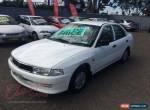 1998 Mitsubishi Lancer CE GLi White Automatic 4sp A Sedan for Sale