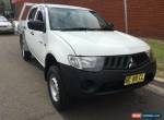 2009 Mitsubishi Triton ML MY09 GLX White Manual 5sp M Dual Cab Utility for Sale