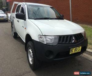 Classic 2009 Mitsubishi Triton ML MY09 GLX White Manual 5sp M Dual Cab Utility for Sale