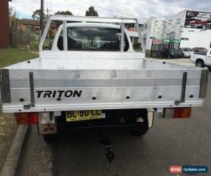 Classic 2009 Mitsubishi Triton ML MY09 GLX White Manual 5sp M Dual Cab Utility for Sale