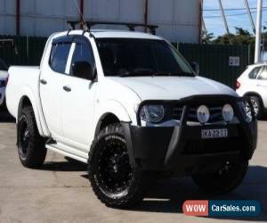 Classic 2013 Mitsubishi Triton MN MY14 GLX (4x4) White Manual 5sp M Dual Cab Utility for Sale