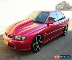 Classic 2002 Holden Calais VX Pink Automatic 4sp A Sedan for Sale