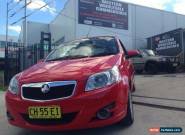 2010 Holden Barina TK MY11 GA Red Manual 5sp M Hatchback for Sale