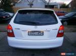 2001 Mazda 323 Astina White Automatic 4sp A Hatchback for Sale