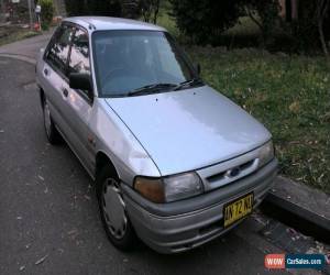 Classic Ford Laser Ghia (1991) 5D Hatchback Automatic (1.8L - Electronic F/INJ) Seats for Sale