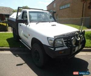 Classic 2005 Nissan Patrol GU IV DX (4x4) White Manual 5sp M Wagon for Sale